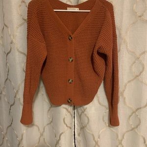 Orange sweater size medium